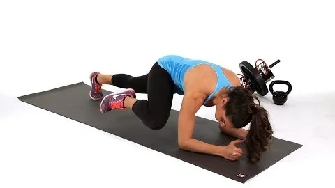 Spiderman Plank Crunch