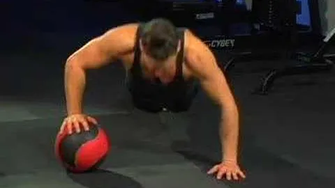 One-arm push-up on medicine ball