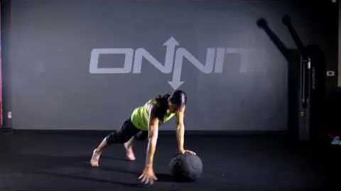 One-arm push-up on medicine ball